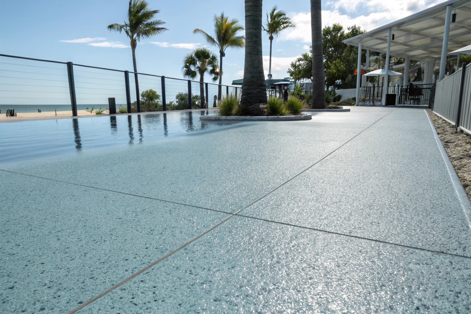 Non-slip epoxy floor coating on Buderim pool deck showing textured surface for wet area safety